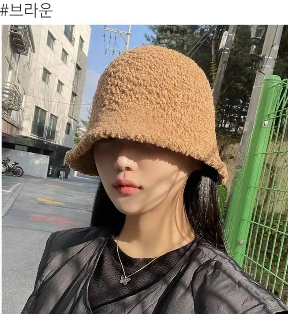 把綿羊戴頭上的漁夫帽