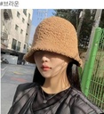 把綿羊戴頭上的漁夫帽