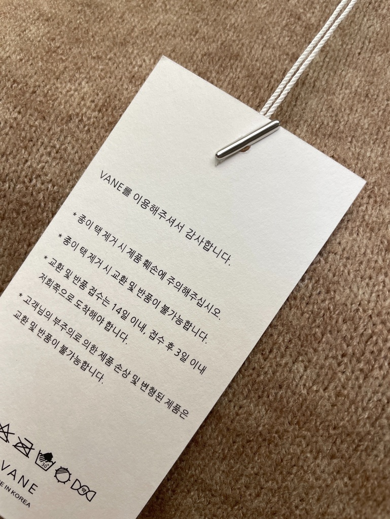 質感特價40%羊毛高領開扣針織背心